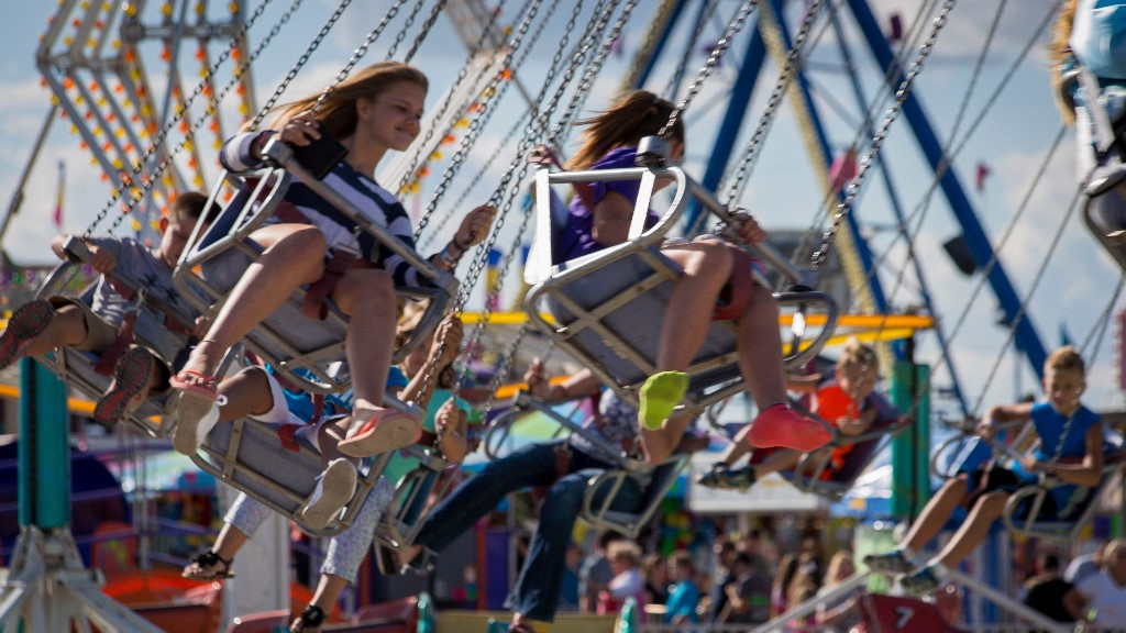 Children on carnival swings at Illinois State Fair.